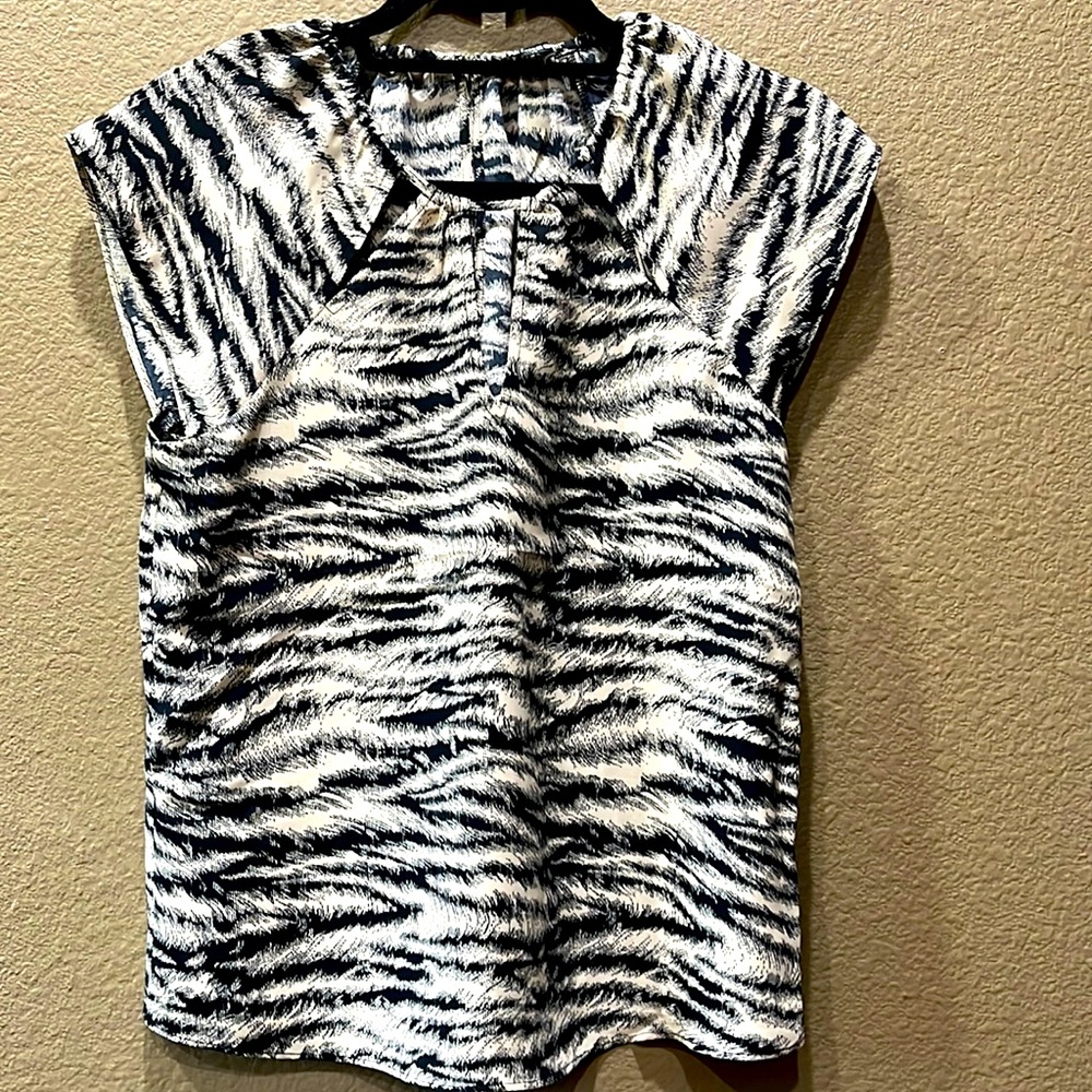 X small Express blouse with cut out detail on neckline. Never worn